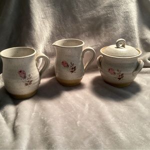 3 piece matching sugar, creamer and 1 mug.